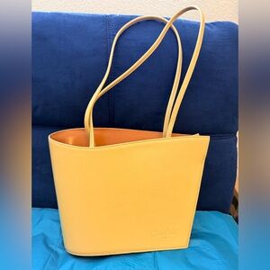 Cleo & Patek Paris Bag Orange Purse Genuine Leather 9"H x 12’’ w, Pre-loved.